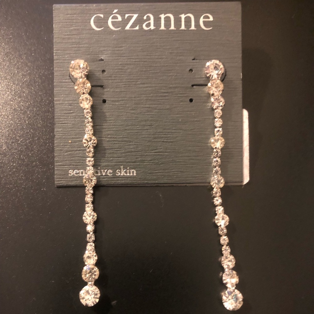 Long false diamond earrings dangle for sensitive